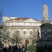 Leonardo da Vinci in Milan – Art & Culture at La Scala • m24o The Leonardo da Vinci monument in Piazza della Scala, Milan, with the facade of Teatro alla Scala in the background.