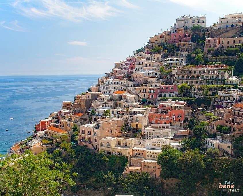 The houses of Positano nestle tightly against the steep coast • m24o The houses of Positano nestle tightly against the steep coast