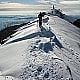 Hiking at the Como Lake to Mount Palanzone in winter