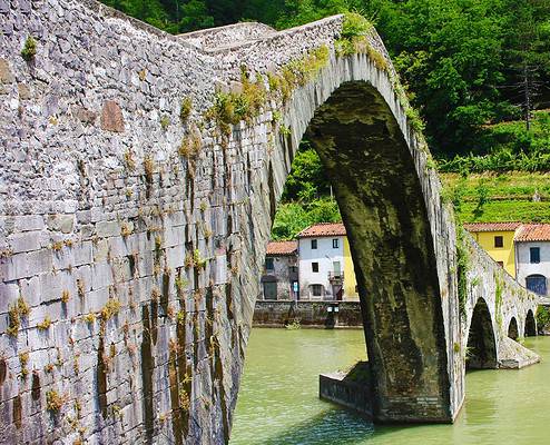 Devil's bridge in the Garfagnana on the Serchio river in Tuscany, Italy