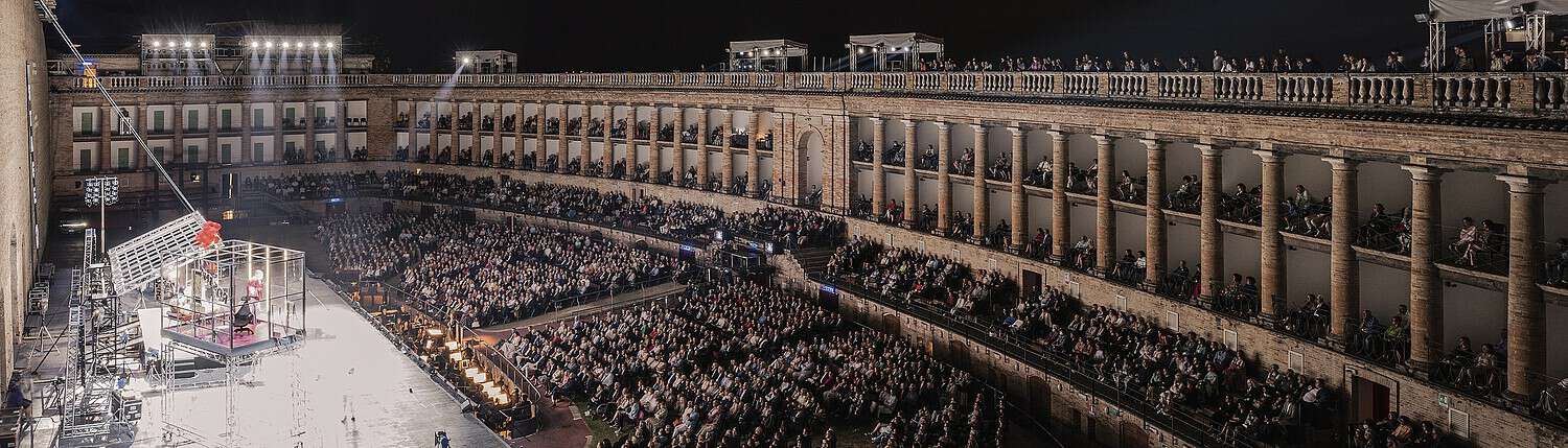 Panoramic view of the historic Arena Sferisterio in Macerata, venue of the Opera Festival, with its impressive neoclassical architecture.