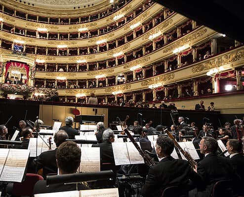 The renowned Teatro alla Scala Orchestra performing on stage in Milan; Photo © Brescia-Amisano.