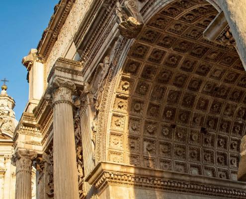 The Arch of Titus is the triumphal arch, dedicated to the Emperor Titus