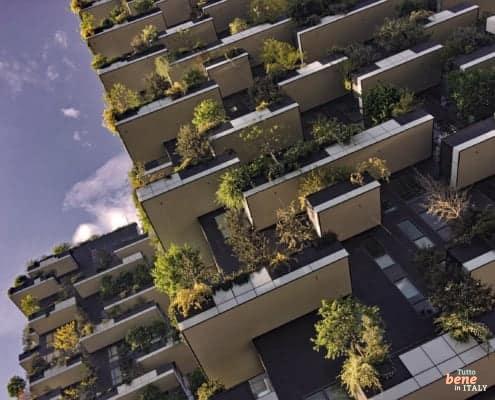 Bosco Verticale Milan – The Vertical Forest in Porta Nuova • m24o The award-winning "Bosco Verticale" residential towers, covered in trees and lush vegetation, located in Milan's modern Porta Nuova district.
