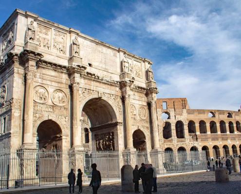 The ancient Rome with Arch of Constantine and Colosseum