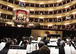 The renowned Teatro alla Scala Orchestra performing on stage in Milan; Photo &copy; Brescia-Amisano.
