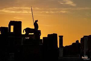 Silhouette of the Forum of Pompeii • m24o Silhouette of the centaur statue by Igor Mitoraj in 1994 in the forum of the ancient city of Pompeii in Italy